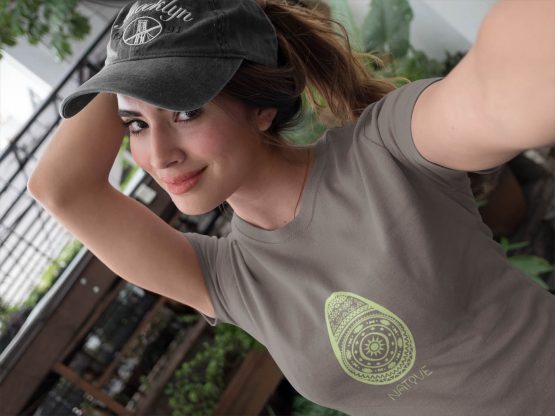 beautiful-girl-wearing-a-native-origins-t-shirt-and-a-hat-outdoors-