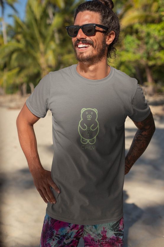 cali-avo-t-shirt-worn-by-a-smiling-man-with-sunglasses-by-the-beach-