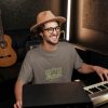 kept-fresh-t-shirt-worn-by-a-happy-man-playing-music-at-a-recording-studio-