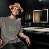kept-fresh-t-shirt-worn-by-a-music-producer-wearing-a-loose-t-shirt-